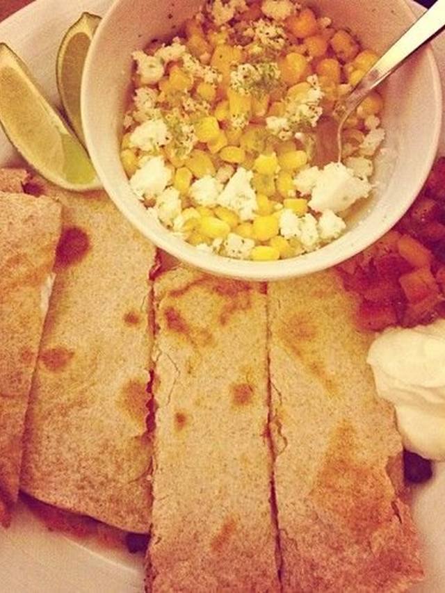 Toasted black bean and corn quesadillas cut into wedges