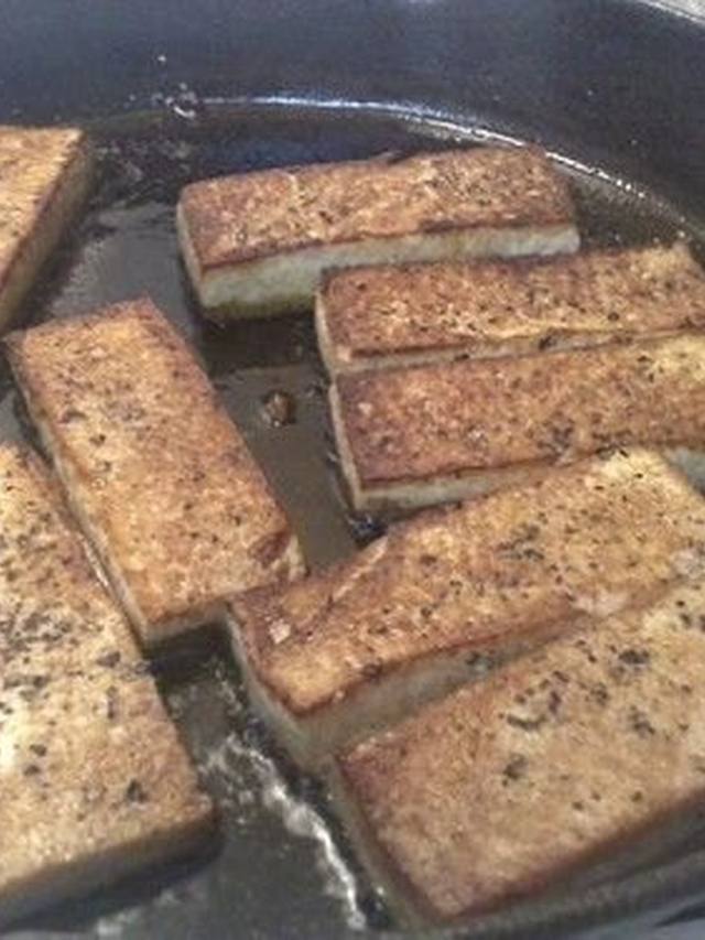 Crisp tofu in a black pepper sauce with onion