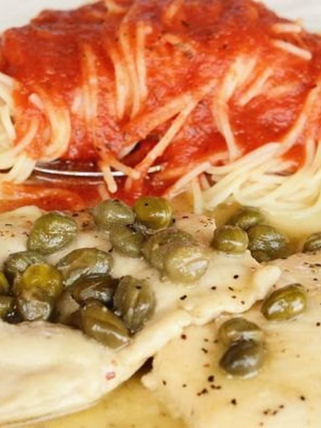 Chicken cutlets in lemon caper sauce in a skillet