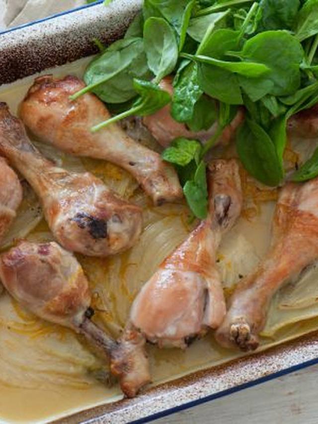 Roasted chicken thighs with caramelized fennel and orange slices
