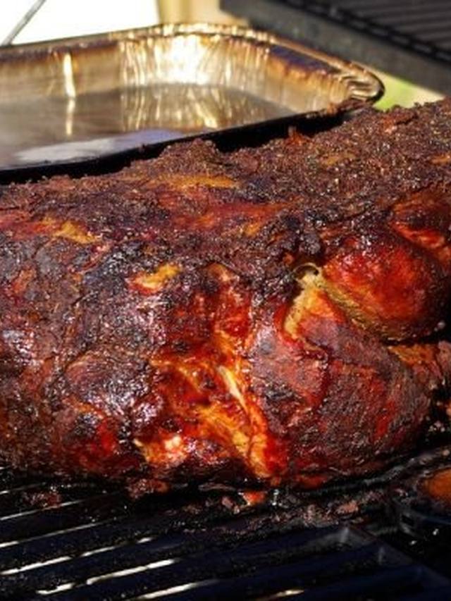 Shredded apple cider pork shoulder on a platter