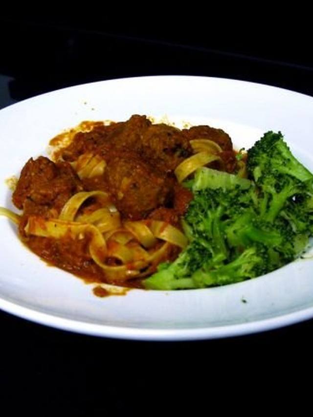 Turkey meatballs in tomato sauce in a serving bowl