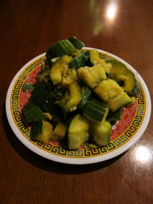 Smashed cucumbers in a garlic chili dressing