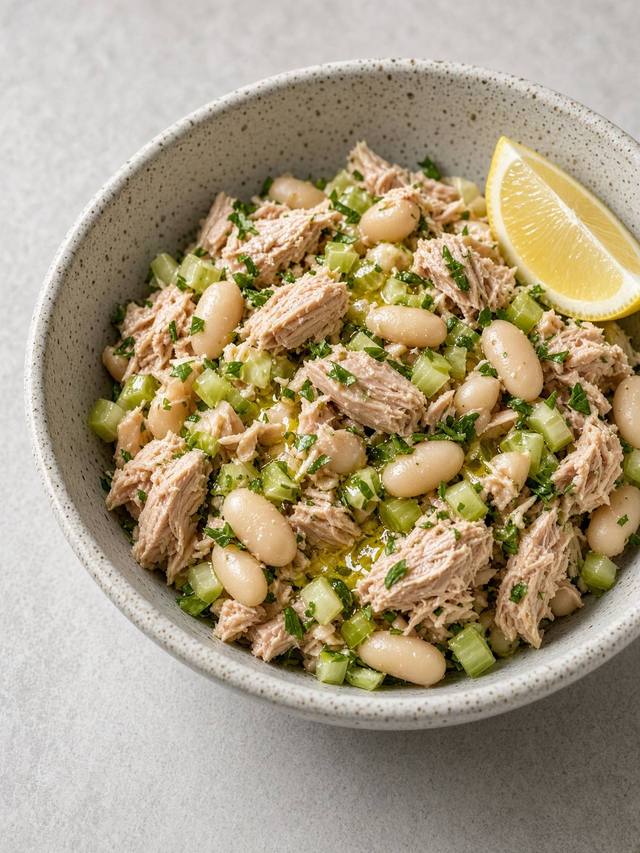 Tuna and white bean salad with parsley and lemon.