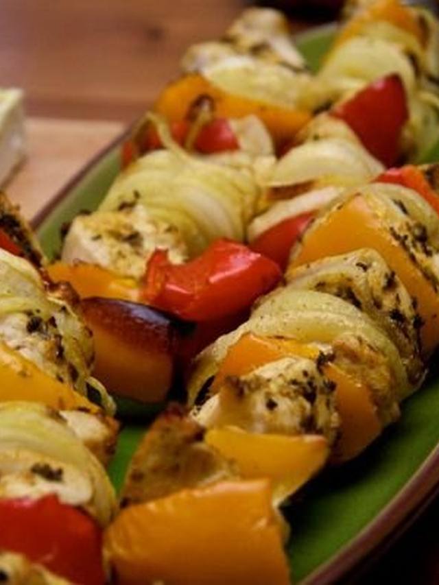 Golden yogurt-marinated chicken skewers with cucumber