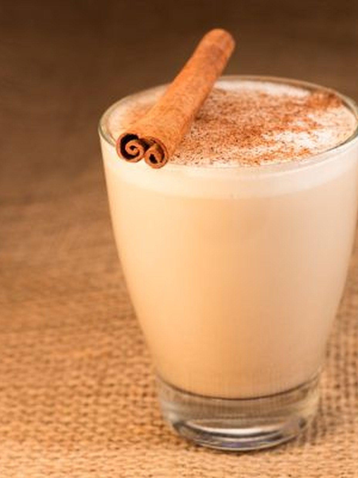 Mug of cinnamon hot chocolate with light foam on top