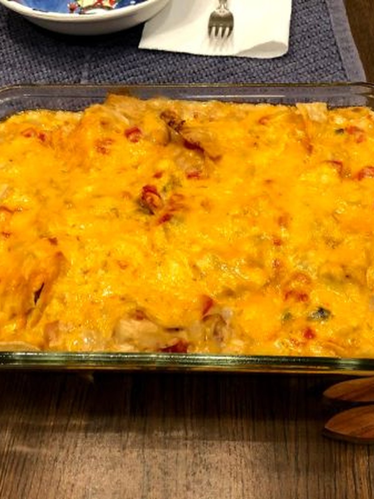 A serving of King Ranch chicken casserole with peppers and tortillas