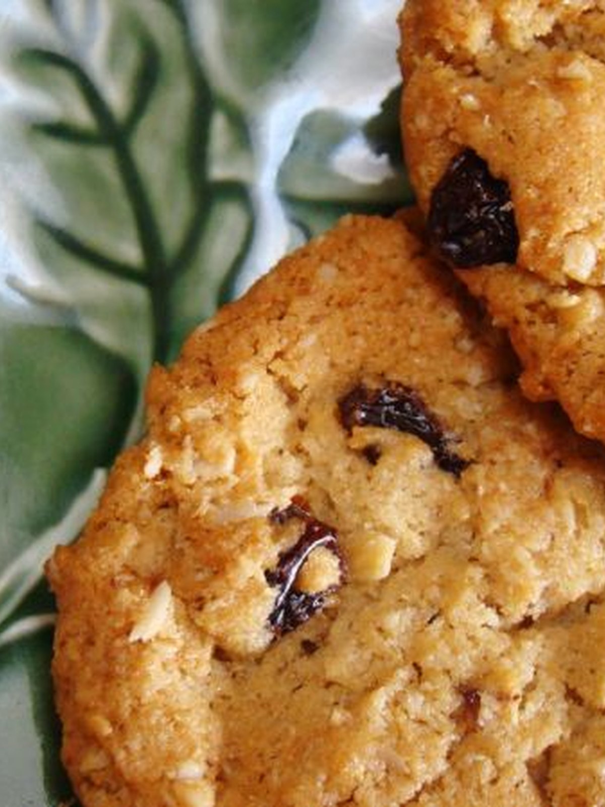 Oatmeal raisin cookies on a cooling rack