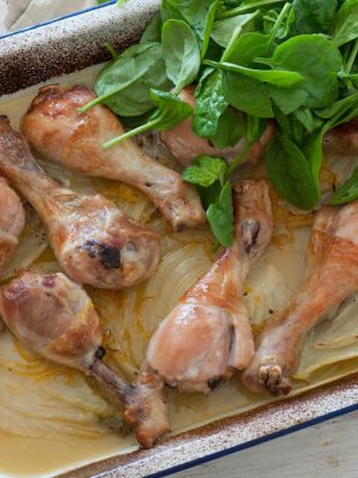 Roasted chicken thighs with caramelized fennel and orange slices