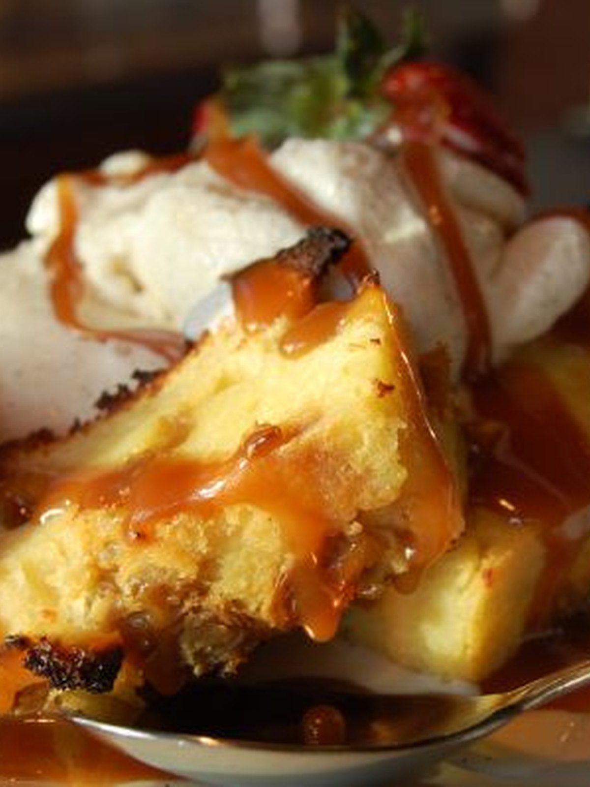 slow cooker bread pudding scooped into a bowl