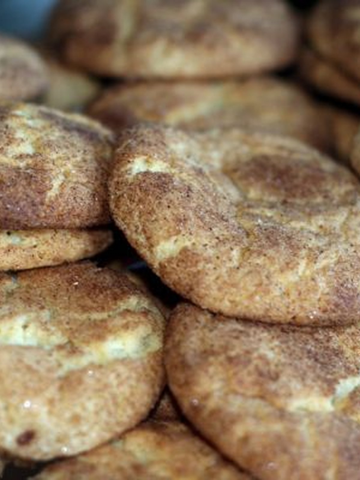 A plate of cracked cinnamon snickerdoodle cookies