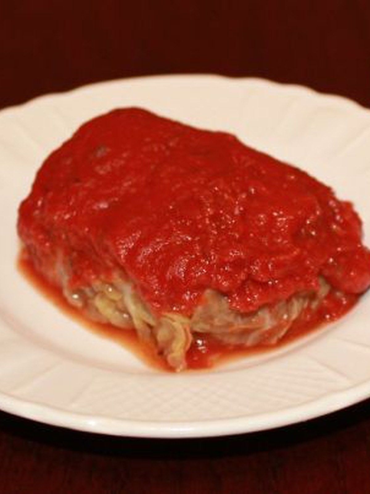 Cabbage rolls in tomato sauce on a platter